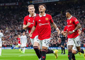 Manchester United's Jadon Sancho (Front) celebrates after scoring during a English Premier League match